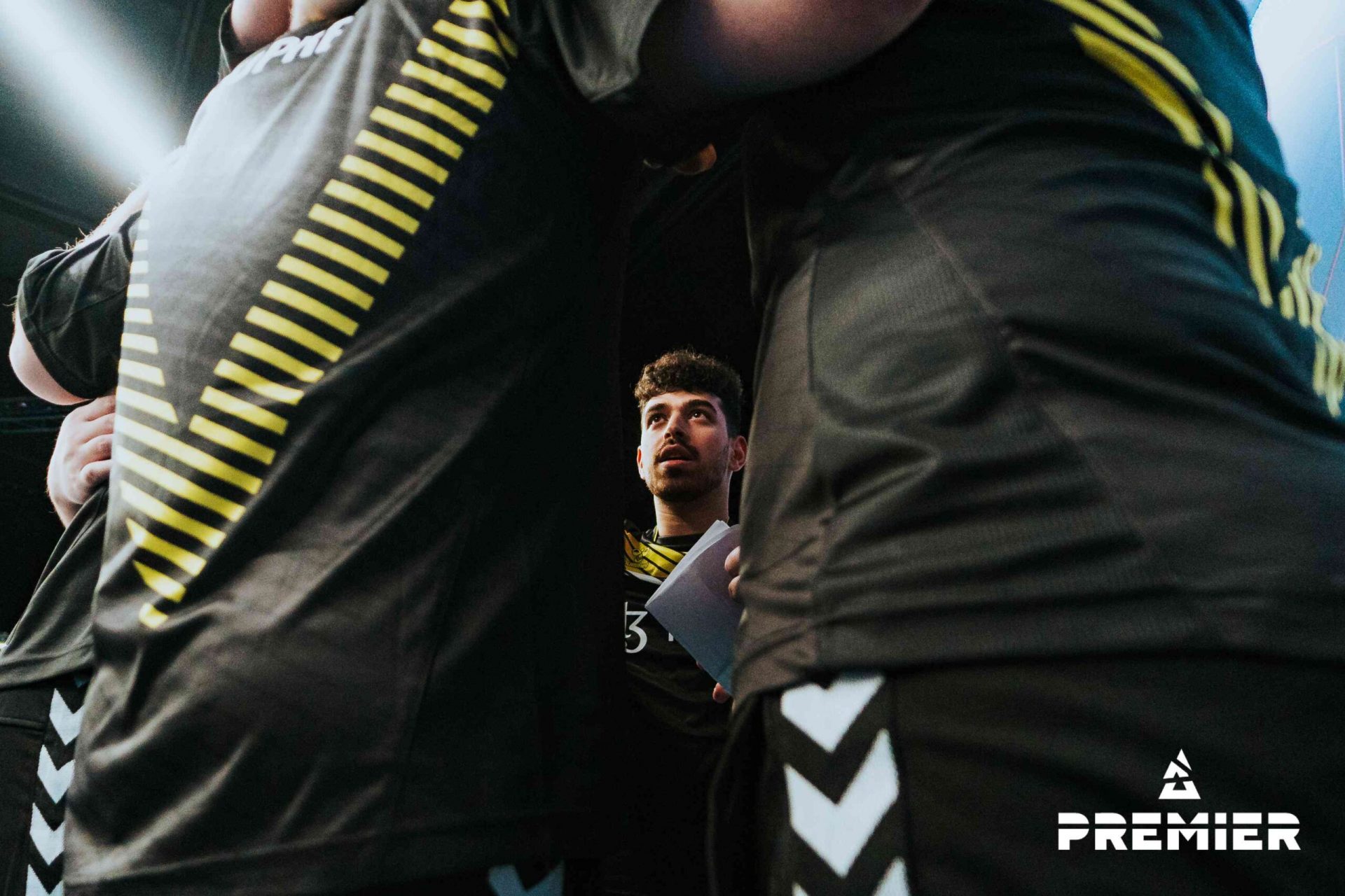 Spinx looks over at his teammates as Vitality celebrate a victory at the BLAST Premier Spring Groups