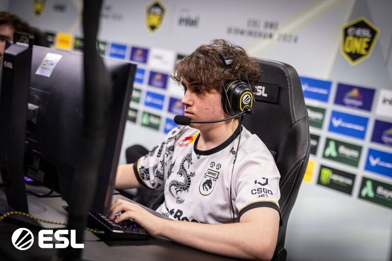 Larl plaing in front of a computer