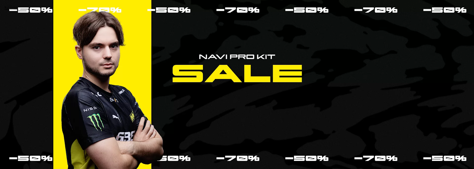 NAVI player sdy stands with arms folded over his chest against a black and yellow background next to the words 