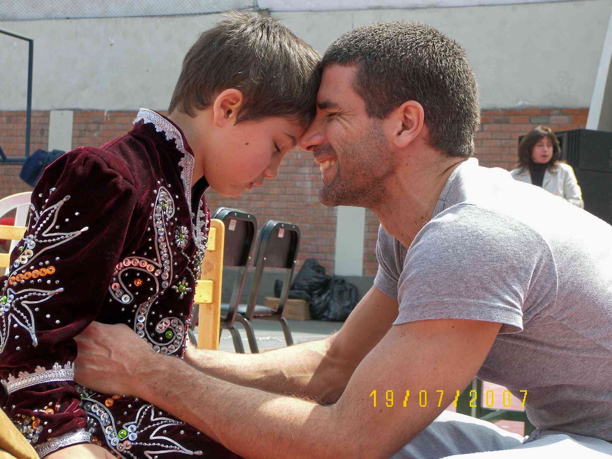 A young Timado with his father