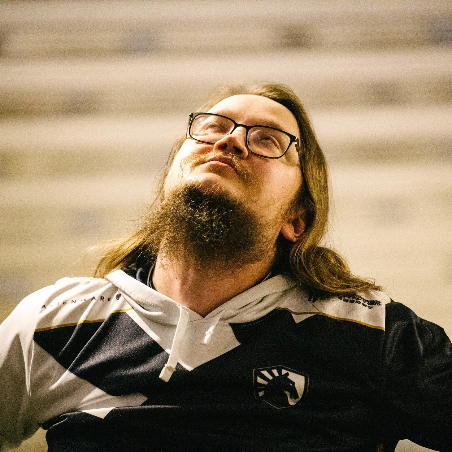 Team Liquid's main carry, Matumbaman, looks up toward the sky in his Team Liquid jersey