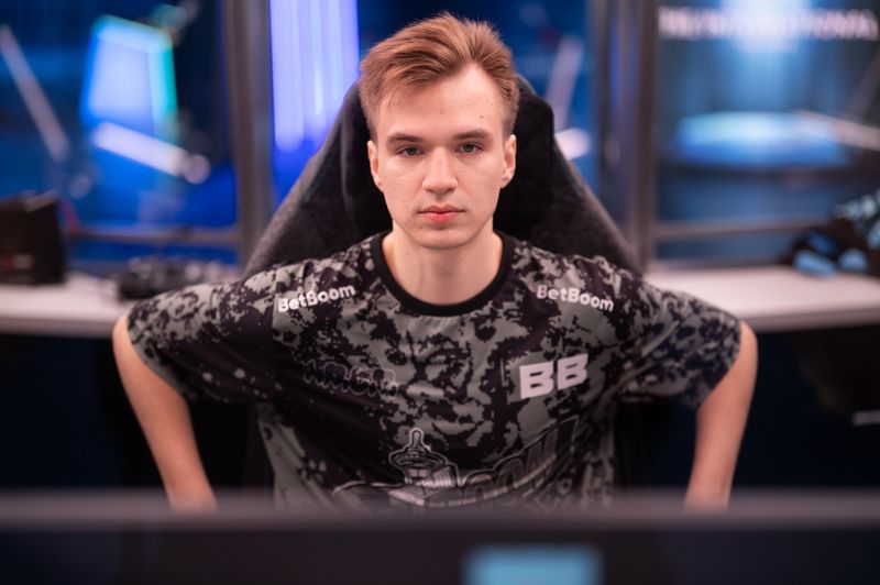 Pure, a Dota 2 player standing on a chair